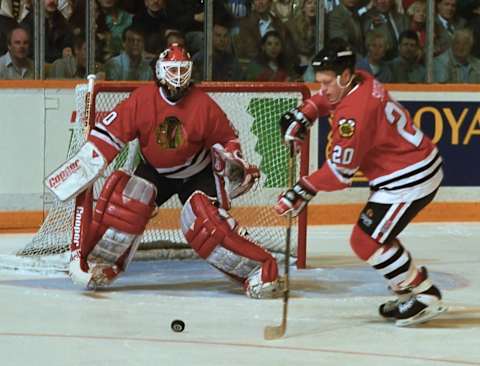 Ed Belfour, Chicago Blackhawks, Gary Suter (Photo by Graig Abel/Getty Images)