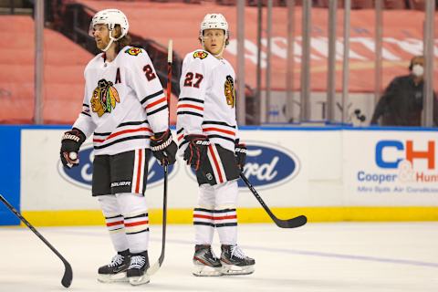 Chicago Blackhawks, Duncan Keith #2, Adam Boqvist #27 Mandatory Credit: Sam Navarro-USA TODAY Sports