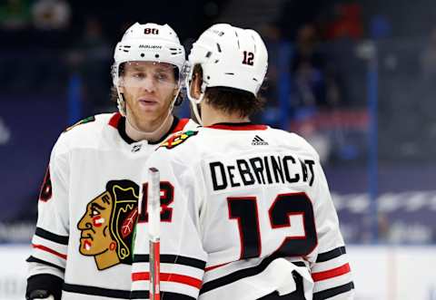 Patrick Kane #88, Chicago Blackhawks, Alex DeBrincat #12 Mandatory Credit: Kim Klement-USA TODAY Sports