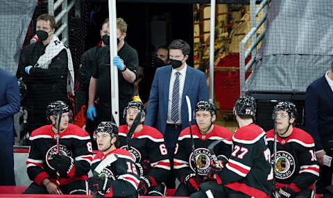 Mar 28, 2021; Chicago, Illinois, USA; Chicago Blackhawks head coach Jeremy Colliton stands behind the bench during the first period at United Center. Mandatory Credit: David Banks-USA TODAY Sports