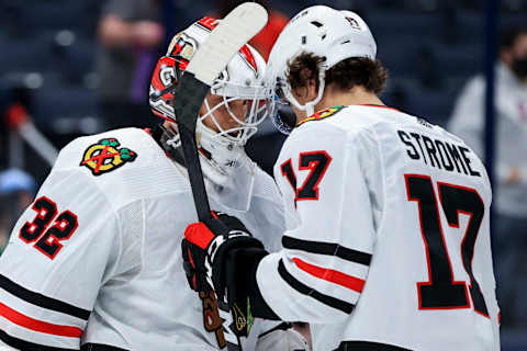 Kevin Lankinen #32, Chicago Blackhawks, Dylan Strome #17 Mandatory Credit: Aaron Doster-USA TODAY Sports