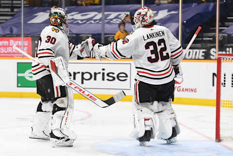 Malcolm Subban #30, Chicago Blackhawks, Kevin Lankinen #32 Mandatory Credit: Christopher Hanewinckel-USA TODAY Sports