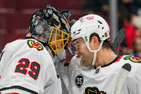 Marc-Andre Fleury #29, Alex DeBrincat #12, Chicago Blackhawks Mandatory Credit: Bob Frid-USA TODAY Sports