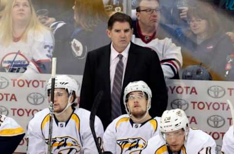 Apr 8, 2017; Winnipeg, Manitoba, CAN; Nashville Predators Peter Laviolette looks on during play between Winnipeg Jets at MTS Centre. Mandatory Credit: James Carey Lauder-USA TODAY Sports