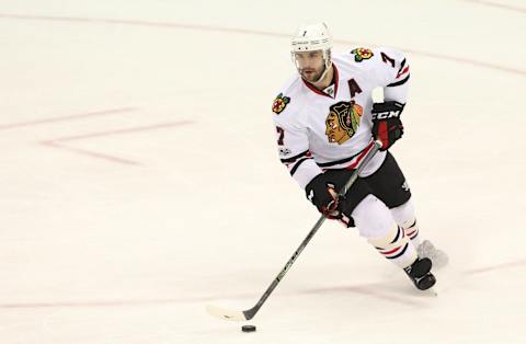 Mar 29, 2017; Pittsburgh, PA, USA; Chicago Blackhawks defenseman Brent Seabrook (7) carries the puck against the Pittsburgh Penguins during the third period at the PPG PAINTS Arena. Chicago won 5-1. Mandatory Credit: Charles LeClaire-USA TODAY Sports