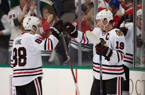 Nov 5, 2016; Dallas, TX, USA; Chicago Blackhawks center Jonathan Toews (19) and right wing Patrick Kane (88) celebrate the win over the Dallas Stars at the American Airlines Center. The Blackhawks defeat the Stars 3-2. Mandatory Credit: Jerome Miron-USA TODAY Sports