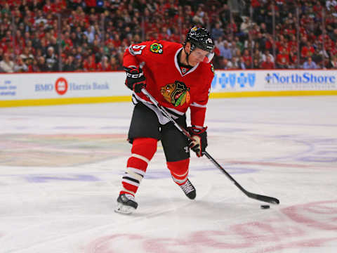 Jan 24, 2017; Chicago, IL, USA; Chicago Blackhawks defenseman Brian Campbell (51) takes a shot during the first period against the Tampa Bay Lightning at the United Center. Mandatory Credit: Dennis Wierzbicki-USA TODAY Sports