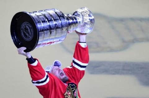 Jun 15, 2015; Chicago, IL, USA; Chicago Blackhawks defenseman Kimmo Timonen hoists the Stanley Cup after defeating the Tampa Bay Lightning in game six of the 2015 Stanley Cup Final at United Center. Mandatory Credit: David Banks-USA TODAY Sports