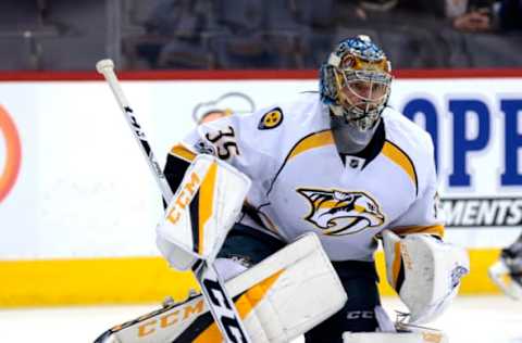 Apr 8, 2017; Winnipeg, Manitoba, CAN; Nashville Predators goalie Pekka Rinne (35) warms up prior to the game against Winnipeg Jets at MTS Centre. Mandatory Credit: James Carey Lauder-USA TODAY Sports