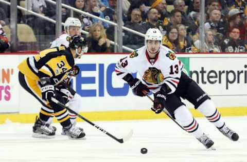 Mar 29, 2017; Pittsburgh, PA, USA; Chicago Blackhawks left wing Tomas Jurco (13) moves the puck against the Pittsburgh Penguins during the third period at the PPG PAINTS Arena. Chicago won 5-1. Mandatory Credit: Charles LeClaire-USA TODAY Sports