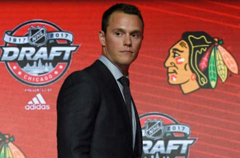 June 23, 2017; Chicago, IL, USA; Chicago Blackhawks center Jonathan Toews walks off the stage after announcing the 29th overall pick during the first round of the 2017 NHL Draft at the United Center. Mandatory Credit: David Banks-USA TODAY Sports