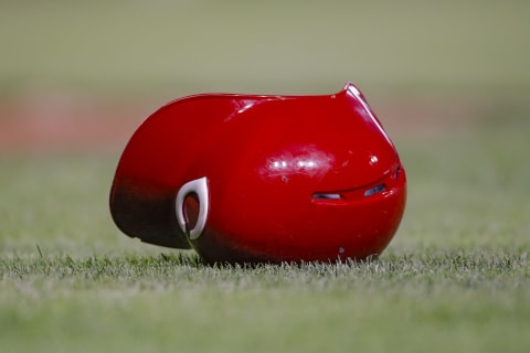 CINCINNATI, OH – AUGUST 11: A Cincinnati Reds helmet is seen on the ground during the game. (Photo by Michael Hickey/Getty Images)