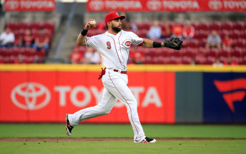 CINCINNATI, OH – SEPTEMBER 26: Jose Peraza #9 of the Cincinnati Reds throws the ball to first base against the Kansas City Royals at Great American Ball Park on September 26, 2018 in Cincinnati, Ohio. (Photo by Andy Lyons/Getty Images)