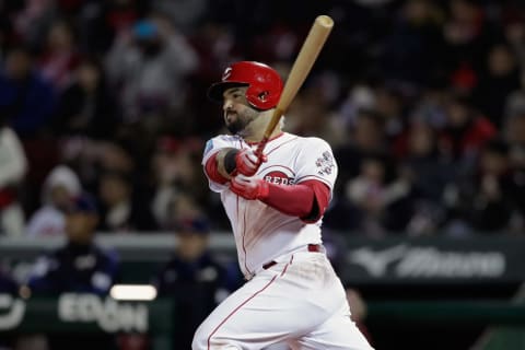 HIROSHIMA, JAPAN – NOVEMBER 13: Infiedler Eugenio Suarez #7 of the Cincinnati Reds hits a grounder in the bottom of 4th inning during the game four between Japan and MLB All Stars at Mazda Zoom Zoom Stadium Hiroshima on November 13, 2018 in Hiroshima, Japan. (Photo by Kiyoshi Ota/Getty Images)