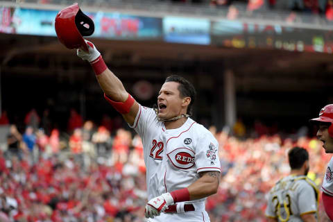 CINCINNATI, OHIO – MARCH 28: Derek Dietrich #22 of the Cincinnati Reds celebrates after hitting a three run home run during the seventh inning of the game against the Pittsburgh Pirates on Opening Day at Great American Ball Park on March 28, 2019 in Cincinnati, Ohio. (Photo by Bobby Ellis/Getty Images)