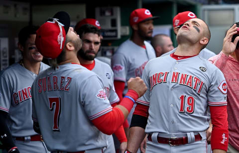 PITTSBURGH, PA – APRIL 06: Joey Votto #19 of the Cincinnati Reds celebrates with Eugenio Suarez #7 after hitting a solo home run in the eighth inning during the game against the Pittsburgh Pirates at PNC Park on April 6, 2019 in Pittsburgh, Pennsylvania. (Photo by Justin Berl/Getty Images)