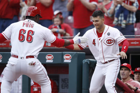 CINCINNATI, OH – APRIL 23: Yasiel Puig #66 of the Cincinnati Reds celebrates with Jose Iglesias #4 after hitting a two-run home run in the first inning against the Atlanta Braves at Great American Ball Park on April 23, 2019 in Cincinnati, Ohio. (Photo by Joe Robbins/Getty Images)