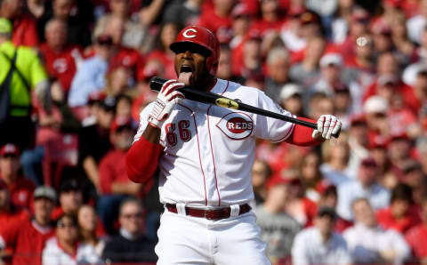 CINCINNATI, OHIO – MARCH 28: Yasiel Puig #66 of the Cincinnati Reds licks his bat after a foul ball during the second inning of the game against the Pittsburgh Pirates on Opening Day between the Pittsburgh Pirates at Great American Ball Park on March 28, 2019 in Cincinnati, Ohio. (Photo by Bobby Ellis/Getty Images)