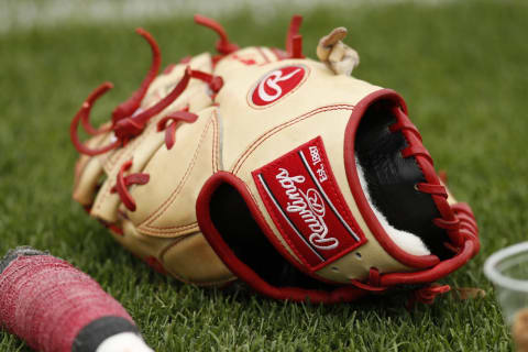 GOODYEAR, FL – MARCH 11: A Cincinnati Reds Rawlings glove on the field during the Spring Training game. (Photo by Mike McGinnis/Getty Images)