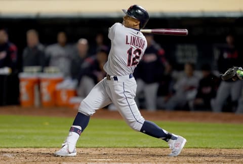 OAKLAND, CA – MAY 10: Francisco Lindor #12 of the Cleveland Indians hits an rbi sacrifice fly scoring Kevin Plawecki #27 against the Oakland Athletics in the top of the seventh inning of a Major League Baseball game at Oakland-Alameda County Coliseum on May 10, 2019 in Oakland, California. (Photo by Thearon W. Henderson/Getty Images)