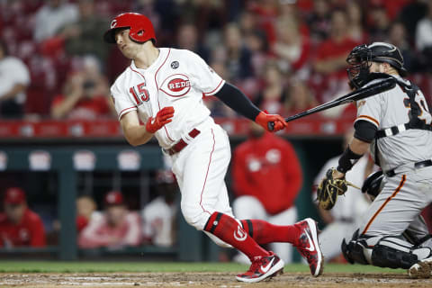 CINCINNATI, OH – MAY 03: Nick Senzel #15 of the Cincinnati Reds hits an infield single for his first Major League hit in the ninth inning against the San Francisco Giants at Great American Ball Park on May 3, 2019 in Cincinnati, Ohio. The Giants won 12-11 in 11 innings. (Photo by Joe Robbins/Getty Images)