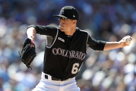 DENVER, COLORADO – JUNE 12: Phillip Diehl #64 of the Colorado Rockies throws in the eighth inning. (Photo by Matthew Stockman/Getty Images)