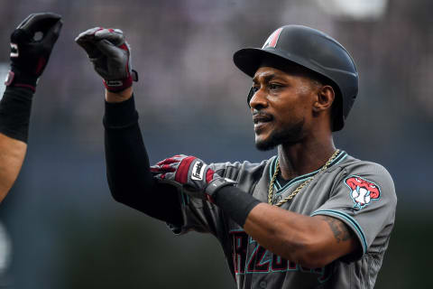 DENVER, CO – AUGUST 13: Jarrod Dyson #1 of the Arizona Diamondbacks celebrates after hitting a first inning leadoff homer against the Colorado Rockies at Coors Field on August 13, 2019 in Denver, Colorado. (Photo by Dustin Bradford/Getty Images)