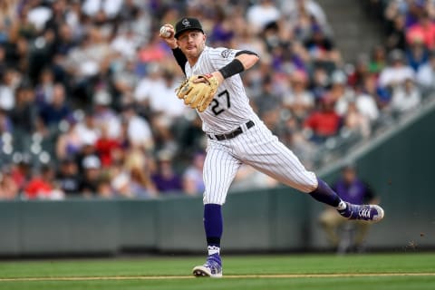 DENVER, CO – JULY 14: Trevor Story #27 of the Colorado Rockies fields a ground ball against the Cincinnati Reds. (Photo by Dustin Bradford/Getty Images)