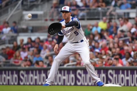 ATLANTA, GEORGIA – AUGUST 03: Freddie Freeman #5 of the Atlanta Braves fields a ball against the Cincinnati Reds. (Photo by Logan Riely/Getty Images)