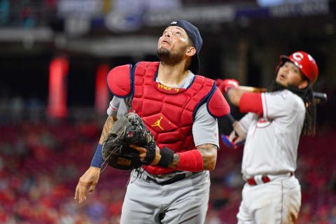 CINCINNATI, OH – AUGUST 15: Yadier Molina #4 of the St. Louis Cardinals chases down a fly ball against the Cincinnati Reds. (Photo by Jamie Sabau/Getty Images)