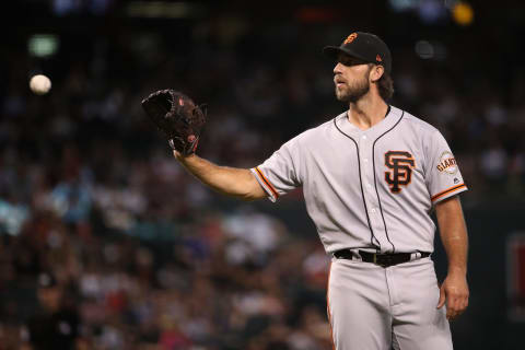 PHOENIX, ARIZONA – AUGUST 18: Starting pitcher Madison Bumgarner #40 of the San Francisco Giants catches a throw back during the third inning of the MLB game against the Arizona Diamondbacks at Chase Field on August 18, 2019 in Phoenix, Arizona. (Photo by Christian Petersen/Getty Images)