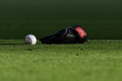 ATLANTA, GEORGIA – AUGUST 22: Detail shot of a bat and glove on the field before the Atlanta Braves vs Miami Marlins game at SunTrust Park on August 22, 2019 in Atlanta, Georgia. (Photo by Logan Riely/Getty Images)