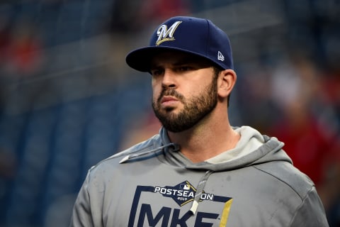 WASHINGTON, DC – OCTOBER 01: Mike Moustakas #11 of the Milwaukee Brewers looks on during batting practice prior to the National League Wild Card game against the Washington Nationals at Nationals Park on October 01, 2019 in Washington, DC. (Photo by Will Newton/Getty Images)