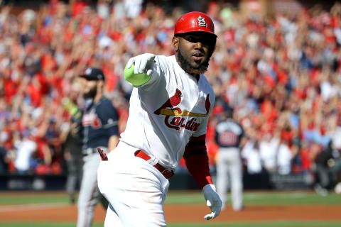 ST LOUIS, MISSOURI – OCTOBER 07: Marcell Ozuna #23 of the St. Louis Cardinals celebrates after hitting a solo home run against the Atlanta Braves during the first inning in game four of the National League Division Series at Busch Stadium on October 07, 2019 in St Louis, Missouri. (Photo by Scott Kane/Getty Images)