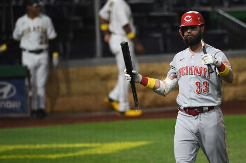 PITTSBURGH, PA – SEPTEMBER 05: Jesse Winker #33 of the Cincinnati Reds walks back to the dugout holding a broken bat after striking out. (Photo by Justin Berl/Getty Images)