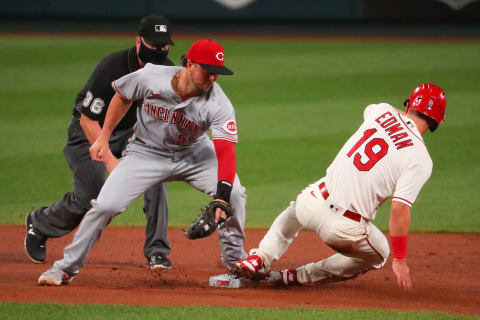 ST LOUIS, MO – SEPTEMBER 12: Tommy Edman #19 of the St. Louis Cardinals steals second base against Kyle Farmer. (Photo by Dilip Vishwanat/Getty Images)