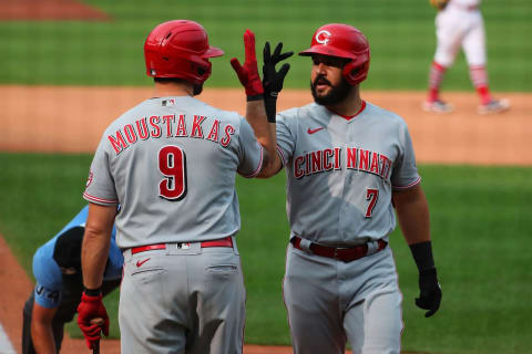 ST LOUIS, MO – SEPTEMBER 13: Eugenio Suarez #7 of the Cincinnati Reds celebrates with Mike Moustakas #9 of the Cincinnati Reds after hitting a home run against the St. Louis Cardinals in the eighth inning at Busch Stadium on September 13, 2020 in St Louis, Missouri. (Photo by Dilip Vishwanat/Getty Images)
