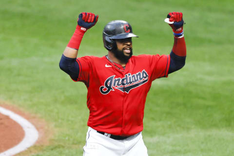 CLEVELAND, OH – SEPTEMBER 23: Carlos Santana #41 of the Cleveland Indians celebrates after hitting a solo home run. (Photo by Ron Schwane/Getty Images)