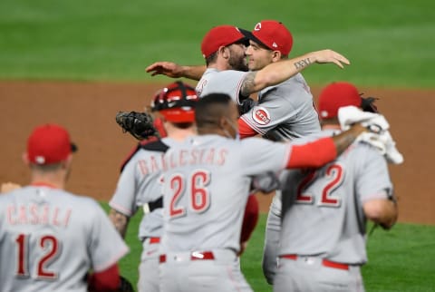 MINNEAPOLIS, MINNESOTA – SEPTEMBER 25: Mike Moustakas #9 and Joey Votto #19 of the Cincinnati Reds celebrate defeating the Minnesota Twins. (Photo by Hannah Foslien/Getty Images)