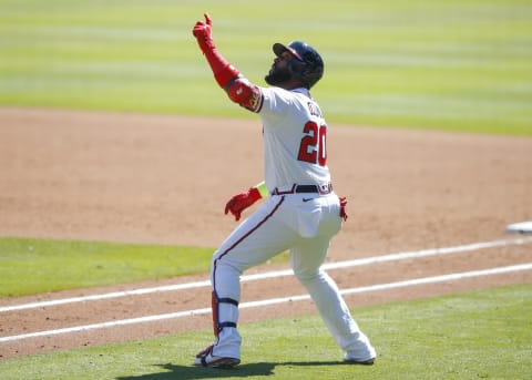 ATLANTA, GA – OCTOBER 01: Marcell Ozuna #20 of the Atlanta Braves reacts after hitting a two run home run in the eighth inning of Game Two of the National League Wild Card Series against the Cincinnati Reds. (Photo by Todd Kirkland/Getty Images)