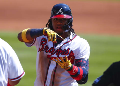 ATLANTA, GA – OCTOBER 01: Ronald Acuna Jr. #13 of the Atlanta Braves reacts after a single in the third inning of Game Two of the National League Wild Card Series against the Cincinnati Reds. (Photo by Todd Kirkland/Getty Images)