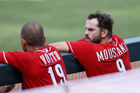 CINCINNATI, OH – JULY 14: Mike Moustakas #9 of the Cincinnati Reds talks to Joey Votto #19 (Photo by Joe Robbins/Getty Images)