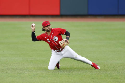 CINCINNATI, OH – JULY 22: Alex Blandino #0 of the Cincinnati Reds throws a runner out after fielding the ball in the seventh inning. (Photo by Joe Robbins/Getty Images)