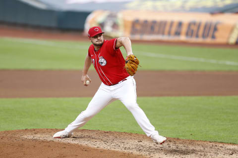 CINCINNATI, OH – JULY 22: Sal Romano #47 of the Cincinnati Reds pitches during an exhibition game. (Photo by Joe Robbins/Getty Images)