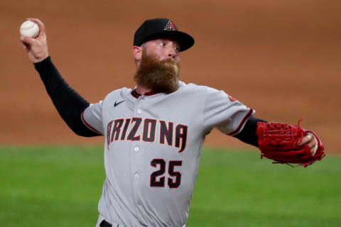 ARLINGTON, TEXAS – JULY 28: Archie Bradley #25 of the Arizona Diamondbacks pitches against the Texas Rangers in the bottom of the ninth inning. (Photo by Tom Pennington/Getty Images)