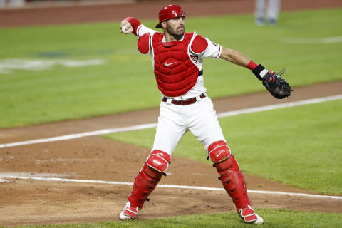 CINCINNATI, OH – JULY 27: Curt Casali #12 of the Cincinnati Reds works behind the plate. (Photo by Joe Robbins/Getty Images)