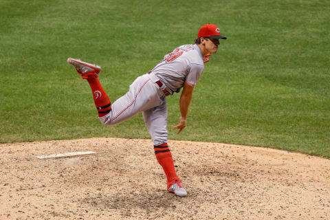 MILWAUKEE, WISCONSIN – AUGUST 07: Lucas Sims #39 of the Cincinnati Reds pitches in the eighth inning (Photo by Dylan Buell/Getty Images)