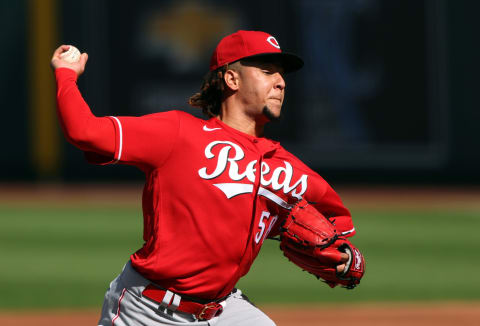 KANSAS CITY, MISSOURI – AUGUST 19: Starting pitcher Luis Castillo #58 of the Cincinnati Reds pitches during the first inning. (Photo by Jamie Squire/Getty Images)