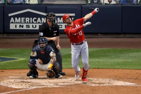 MILWAUKEE, WISCONSIN – AUGUST 24: Curt Casali #12 of the Cincinnati Reds hits a home run. (Photo by Dylan Buell/Getty Images)