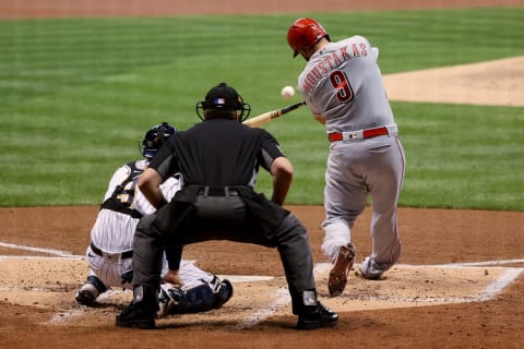 MILWAUKEE, WISCONSIN – AUGUST 27: Mike Moustakas #9 of the Cincinnati Reds hits a single. (Photo by Dylan Buell/Getty Images)